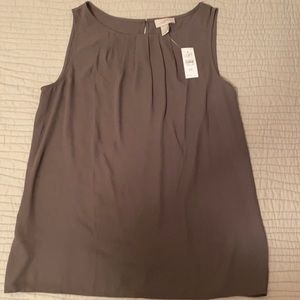 Grey sleeveless blouse
